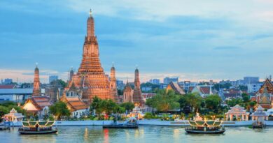 Wat Arun and cruise ship in Bangkok Thailand